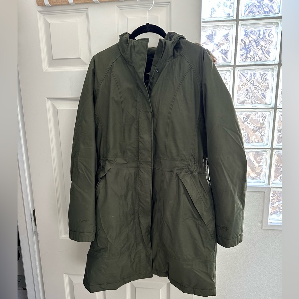 Olive green winter jacket with removable faux fur hood. In great condition.
